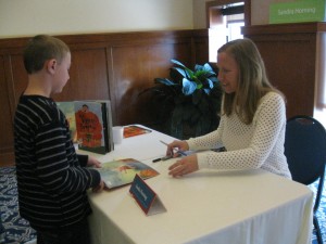 Sandra signing at the book fair. 